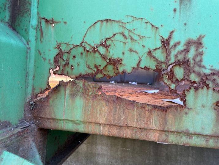 Beschadiging vloeistofdichte container